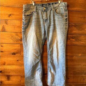 Seven7 Blue Relaxed Jeans with Distressed Details